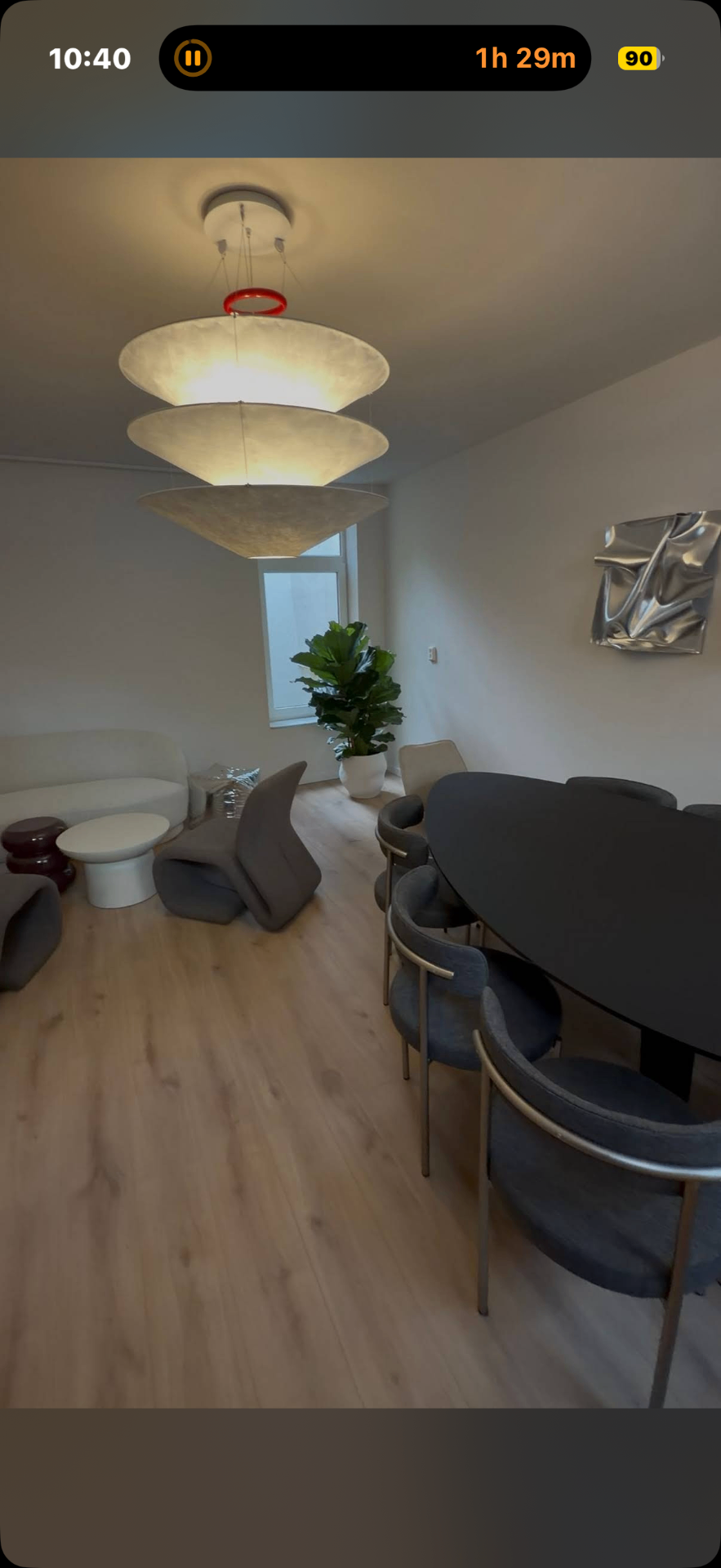 Upstairs room with sculptural pendant lights